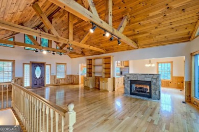 Breathtaking views abound from this 3-bedroom, 3.5-bath home on on Chatuge Shores Golf Course in North Carolina - for sale on GolfHomes.com, golf home, golf lot
