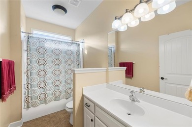 Well-maintained reverse 1.5-story single-family home in the on Golf Club of Creekmoor in Missouri - for sale on GolfHomes.com, golf home, golf lot