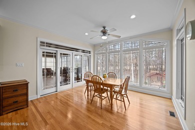 Step into this stunning Zaytoun-Raines custom home and you'll be on Cypress Landing Golf Club in North Carolina - for sale on GolfHomes.com, golf home, golf lot