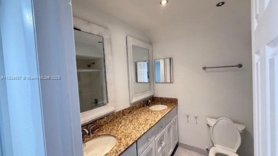 Spacious Corner  Unit townhouse features 4 bedrooms with 2 and on Davie Golf Club in Florida - for sale on GolfHomes.com, golf home, golf lot