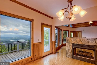 Breathtaking views abound from this 3-bedroom, 3.5-bath home on on Chatuge Shores Golf Course in North Carolina - for sale on GolfHomes.com, golf home, golf lot