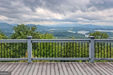 Breathtaking views abound from this 3-bedroom, 3.5-bath home on on Chatuge Shores Golf Course in North Carolina - for sale on GolfHomes.com, golf home, golf lot