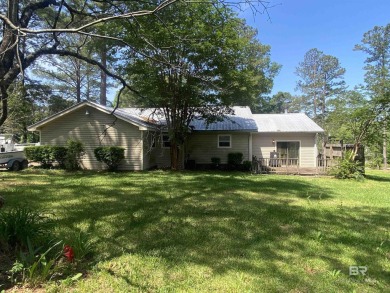 Welcome to this charming ranch-style home situated on a spacious on Vanity Fair Golf and Tennis Club in Alabama - for sale on GolfHomes.com, golf home, golf lot
