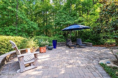 Step into this stunning Zaytoun-Raines custom home and you'll be on Cypress Landing Golf Club in North Carolina - for sale on GolfHomes.com, golf home, golf lot