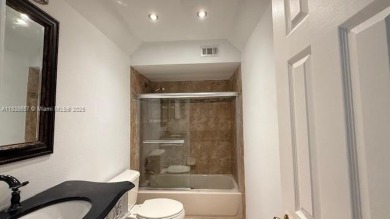 Spacious Corner  Unit townhouse features 4 bedrooms with 2 and on Davie Golf Club in Florida - for sale on GolfHomes.com, golf home, golf lot