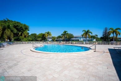 CUTE AS A BUTTON! CHARMING SECOND FLOOR 1 BEDROOM, 1 BATH CONDO on Hillsboro Pines Golf in Florida - for sale on GolfHomes.com, golf home, golf lot