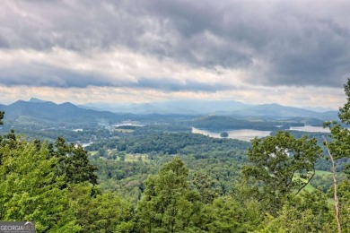 Breathtaking views abound from this 3-bedroom, 3.5-bath home on on Chatuge Shores Golf Course in North Carolina - for sale on GolfHomes.com, golf home, golf lot