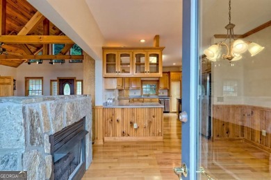 Breathtaking views abound from this 3-bedroom, 3.5-bath home on on Chatuge Shores Golf Course in North Carolina - for sale on GolfHomes.com, golf home, golf lot