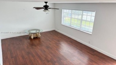 Spacious Corner  Unit townhouse features 4 bedrooms with 2 and on Davie Golf Club in Florida - for sale on GolfHomes.com, golf home, golf lot