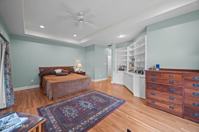 Step into this stunning Zaytoun-Raines custom home and you'll be on Cypress Landing Golf Club in North Carolina - for sale on GolfHomes.com, golf home, golf lot