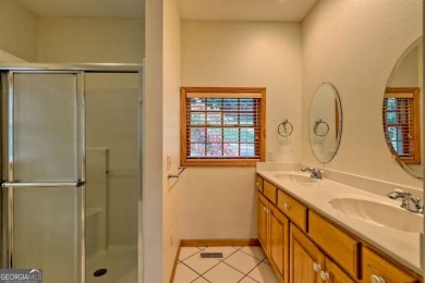 Breathtaking views abound from this 3-bedroom, 3.5-bath home on on Chatuge Shores Golf Course in North Carolina - for sale on GolfHomes.com, golf home, golf lot
