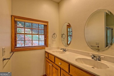 Breathtaking views abound from this 3-bedroom, 3.5-bath home on on Chatuge Shores Golf Course in North Carolina - for sale on GolfHomes.com, golf home, golf lot