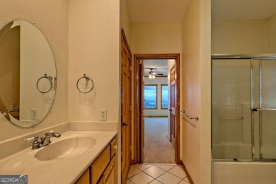 Breathtaking views abound from this 3-bedroom, 3.5-bath home on on Chatuge Shores Golf Course in North Carolina - for sale on GolfHomes.com, golf home, golf lot