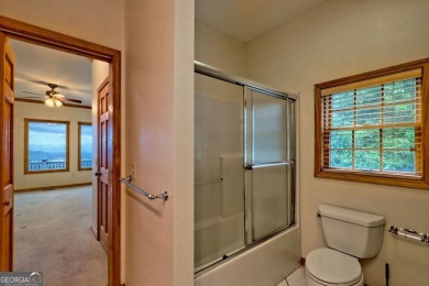 Breathtaking views abound from this 3-bedroom, 3.5-bath home on on Chatuge Shores Golf Course in North Carolina - for sale on GolfHomes.com, golf home, golf lot