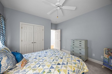 Step into this stunning Zaytoun-Raines custom home and you'll be on Cypress Landing Golf Club in North Carolina - for sale on GolfHomes.com, golf home, golf lot