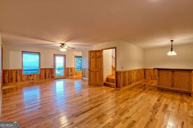 Breathtaking views abound from this 3-bedroom, 3.5-bath home on on Chatuge Shores Golf Course in North Carolina - for sale on GolfHomes.com, golf home, golf lot