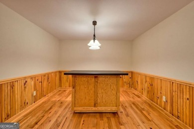 Breathtaking views abound from this 3-bedroom, 3.5-bath home on on Chatuge Shores Golf Course in North Carolina - for sale on GolfHomes.com, golf home, golf lot