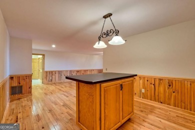 Breathtaking views abound from this 3-bedroom, 3.5-bath home on on Chatuge Shores Golf Course in North Carolina - for sale on GolfHomes.com, golf home, golf lot