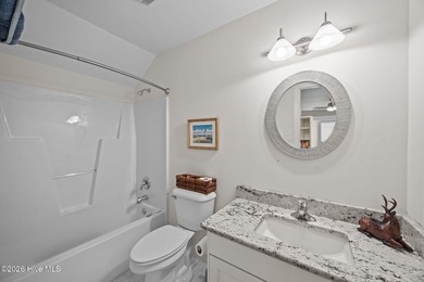 Step into this stunning Zaytoun-Raines custom home and you'll be on Cypress Landing Golf Club in North Carolina - for sale on GolfHomes.com, golf home, golf lot