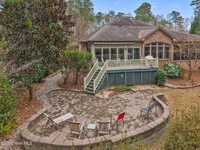 Step into this stunning Zaytoun-Raines custom home and you'll be on Cypress Landing Golf Club in North Carolina - for sale on GolfHomes.com, golf home, golf lot