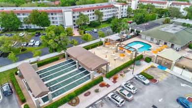 Beautifully renovated 2/2 condo with exquisite details on Wynmoor Golf Course in Florida - for sale on GolfHomes.com, golf home, golf lot