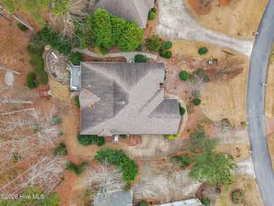 Step into this stunning Zaytoun-Raines custom home and you'll be on Cypress Landing Golf Club in North Carolina - for sale on GolfHomes.com, golf home, golf lot