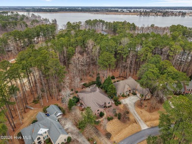 Step into this stunning Zaytoun-Raines custom home and you'll be on Cypress Landing Golf Club in North Carolina - for sale on GolfHomes.com, golf home, golf lot
