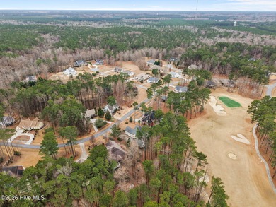 Step into this stunning Zaytoun-Raines custom home and you'll be on Cypress Landing Golf Club in North Carolina - for sale on GolfHomes.com, golf home, golf lot