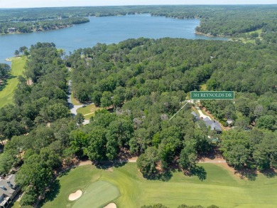 Nestled amidst the tranquil beauty of the prestigious Jack on Great Waters Course At Reynolds Plantation in Georgia - for sale on GolfHomes.com, golf home, golf lot