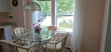This fully furnished 1995 2-bed, 2-bath waterfront home in the on The Club At Pointe West in Florida - for sale on GolfHomes.com, golf home, golf lot