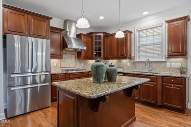 Perfectly positioned above the 10th tee and rolling fairways of on Chapel Ridge Golf Club in North Carolina - for sale on GolfHomes.com, golf home, golf lot