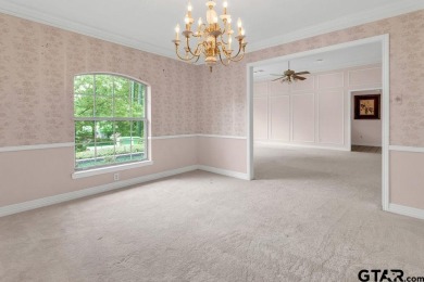 Set on a beautifully landscaped, oversized, 1 plus acre lot on Hide-A-Way Lake Golf Course in Texas - for sale on GolfHomes.com, golf home, golf lot