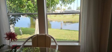 This fully furnished 1995 2-bed, 2-bath waterfront home in the on The Club At Pointe West in Florida - for sale on GolfHomes.com, golf home, golf lot