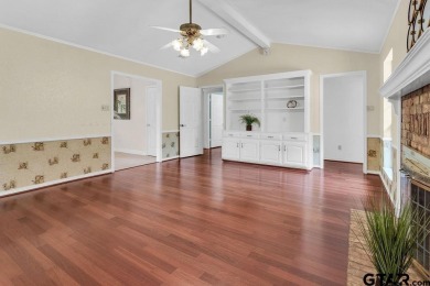 Set on a beautifully landscaped, oversized, 1 plus acre lot on Hide-A-Way Lake Golf Course in Texas - for sale on GolfHomes.com, golf home, golf lot