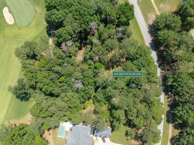 Nestled amidst the tranquil beauty of the prestigious Jack on Great Waters Course At Reynolds Plantation in Georgia - for sale on GolfHomes.com, golf home, golf lot