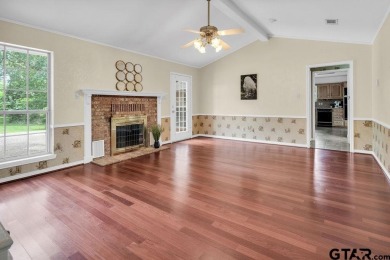 Set on a beautifully landscaped, oversized, 1 plus acre lot on Hide-A-Way Lake Golf Course in Texas - for sale on GolfHomes.com, golf home, golf lot