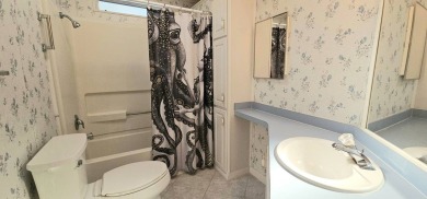 This fully furnished 1995 2-bed, 2-bath waterfront home in the on The Club At Pointe West in Florida - for sale on GolfHomes.com, golf home, golf lot