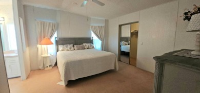 This fully furnished 1995 2-bed, 2-bath waterfront home in the on The Club At Pointe West in Florida - for sale on GolfHomes.com, golf home, golf lot