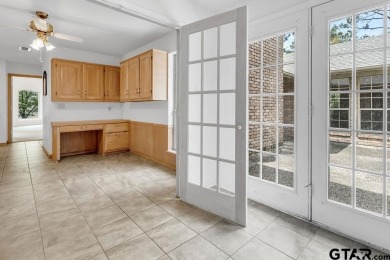 Set on a beautifully landscaped, oversized, 1 plus acre lot on Hide-A-Way Lake Golf Course in Texas - for sale on GolfHomes.com, golf home, golf lot