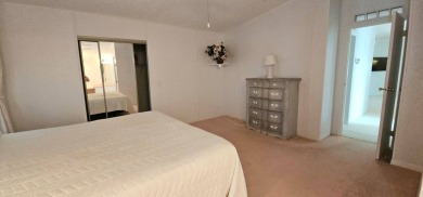 This fully furnished 1995 2-bed, 2-bath waterfront home in the on The Club At Pointe West in Florida - for sale on GolfHomes.com, golf home, golf lot