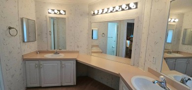 This fully furnished 1995 2-bed, 2-bath waterfront home in the on The Club At Pointe West in Florida - for sale on GolfHomes.com, golf home, golf lot