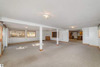 Lakefront home with 2 bedrooms, 3 full bathrooms, and over 2600 on Eagle Glen Golf Course in Michigan - for sale on GolfHomes.com, golf home, golf lot