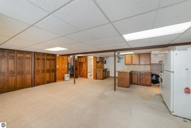 Lakefront home with 2 bedrooms, 3 full bathrooms, and over 2600 on Eagle Glen Golf Course in Michigan - for sale on GolfHomes.com, golf home, golf lot