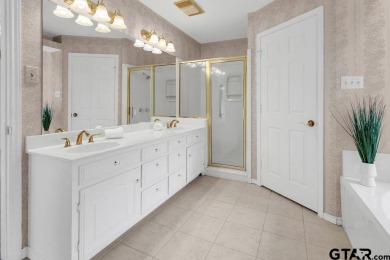Set on a beautifully landscaped, oversized, 1 plus acre lot on Hide-A-Way Lake Golf Course in Texas - for sale on GolfHomes.com, golf home, golf lot