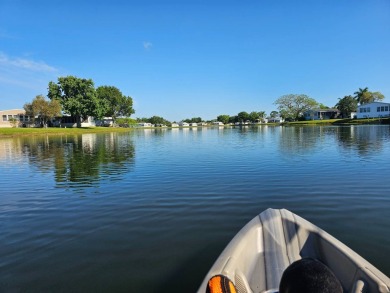 This fully furnished 1995 2-bed, 2-bath waterfront home in the on The Club At Pointe West in Florida - for sale on GolfHomes.com, golf home, golf lot