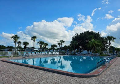 This fully furnished 1995 2-bed, 2-bath waterfront home in the on The Club At Pointe West in Florida - for sale on GolfHomes.com, golf home, golf lot