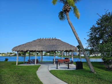 This fully furnished 1995 2-bed, 2-bath waterfront home in the on The Club At Pointe West in Florida - for sale on GolfHomes.com, golf home, golf lot