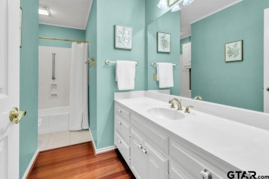 Set on a beautifully landscaped, oversized, 1 plus acre lot on Hide-A-Way Lake Golf Course in Texas - for sale on GolfHomes.com, golf home, golf lot