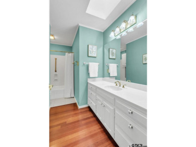 Set on a beautifully landscaped, oversized, 1 plus acre lot on Hide-A-Way Lake Golf Course in Texas - for sale on GolfHomes.com, golf home, golf lot
