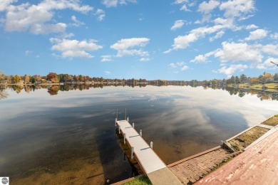 Lakefront home with 2 bedrooms, 3 full bathrooms, and over 2600 on Eagle Glen Golf Course in Michigan - for sale on GolfHomes.com, golf home, golf lot